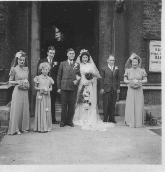 Taken at St. Johns Church, Upper Holloway at the wedding of William( Jack) and Doris Magill. George Wicks and Ivy Magill also married in this church    L to R. Parents of the Groom, The bride and Groom, Parents of the Bride     Bridesmaids are not known
